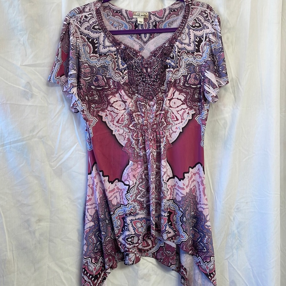 World Unity brand purple tunic-blouse, size women’s medium.
